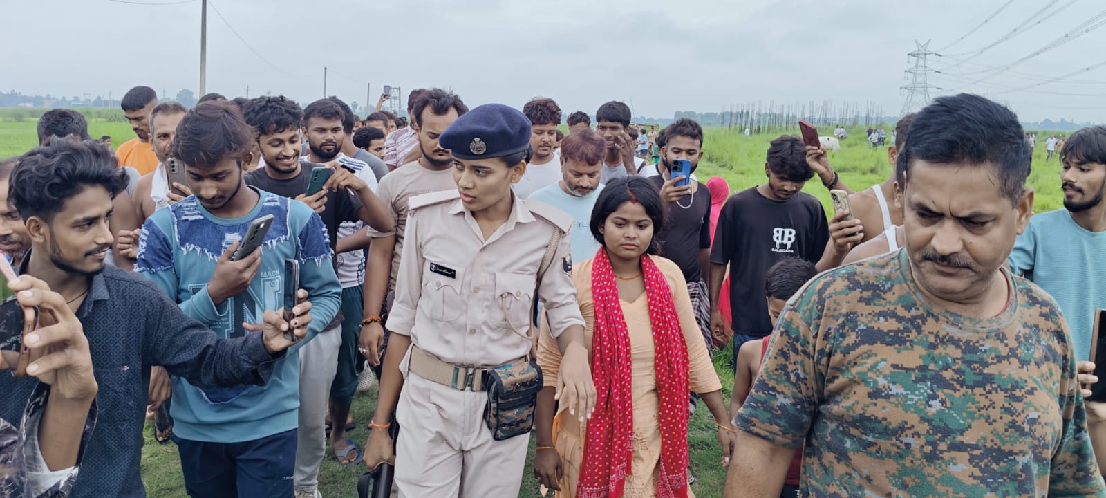 Woman Climbs 132 kV High-Tension Power Tower After Family Dispute; Timely Police Intervention Averts Tragedy